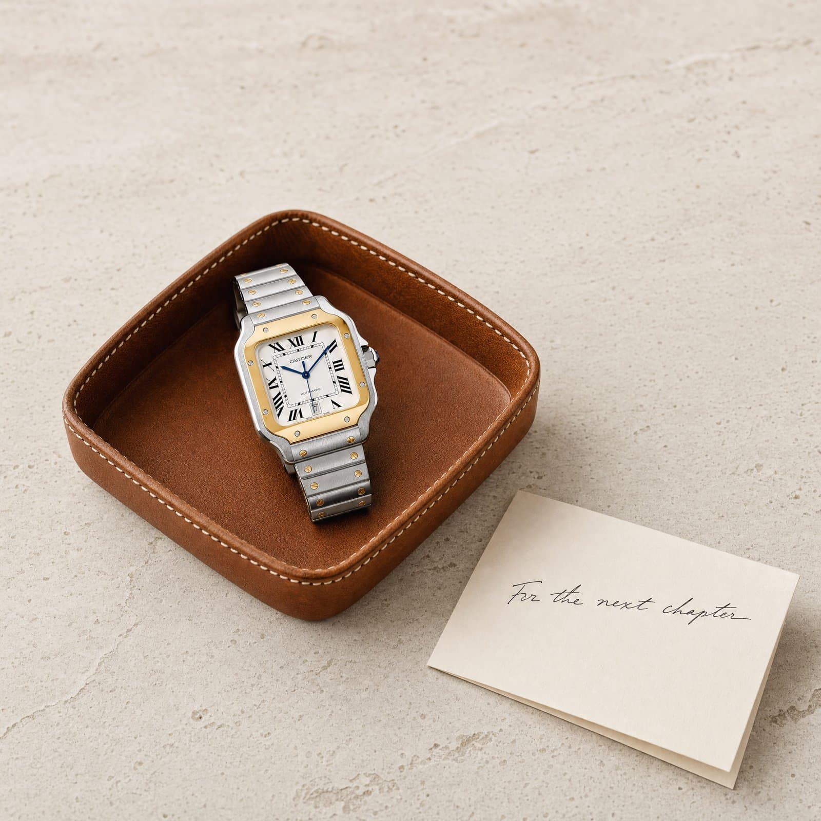Cartier Santos references together on travertine