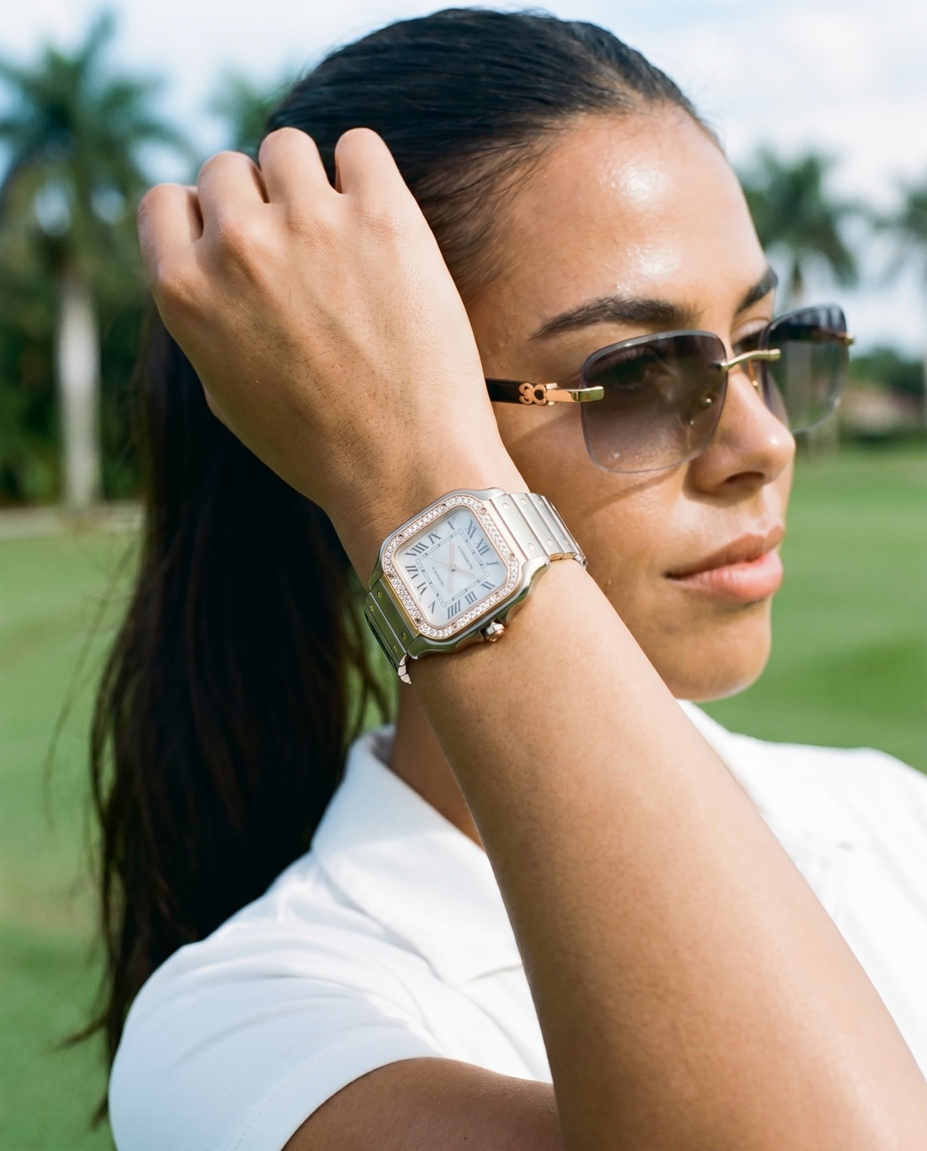 A woman golfer with a diamond F.P. Journe Élégante