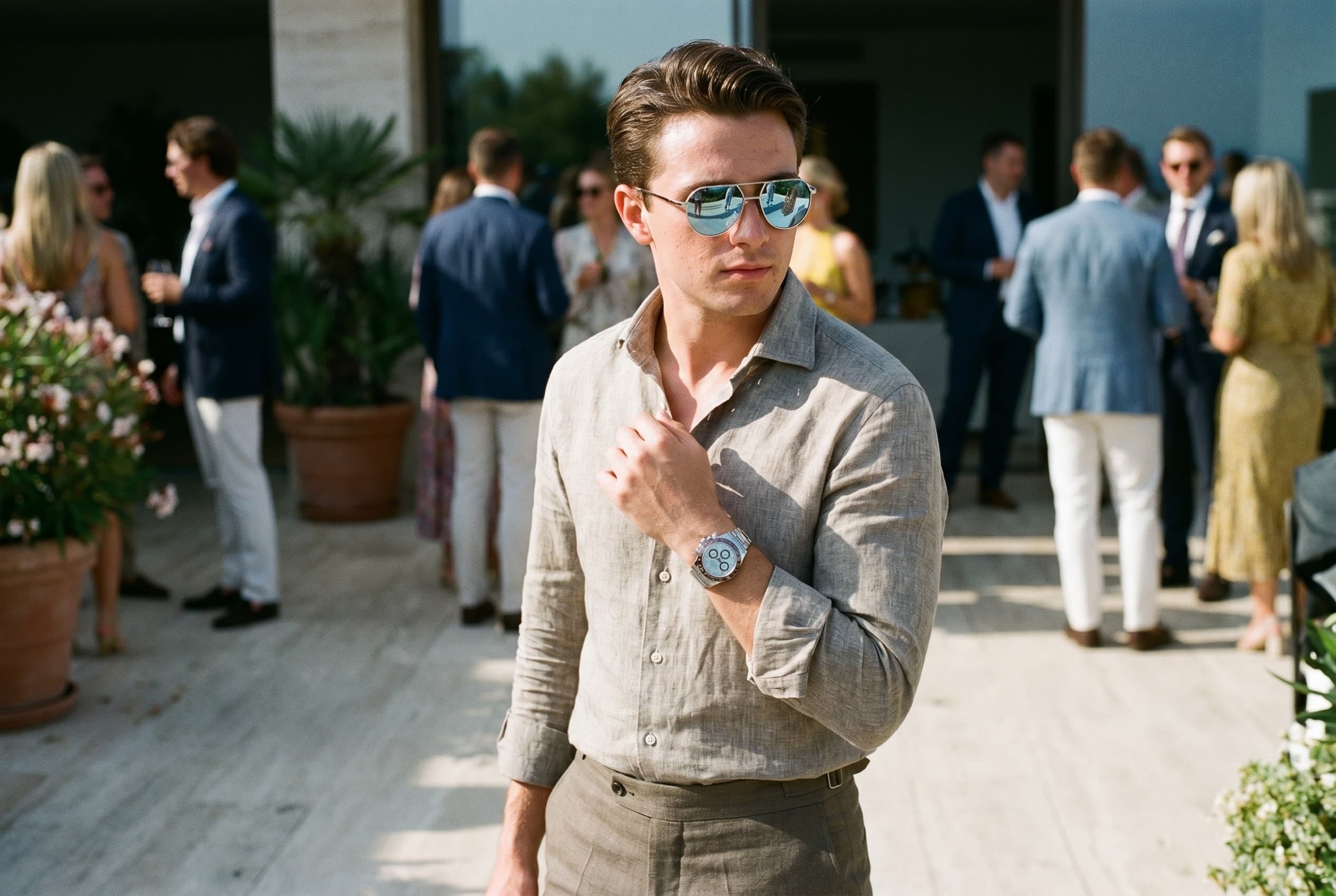 Soletti aviators with a platinum Rolex Daytona