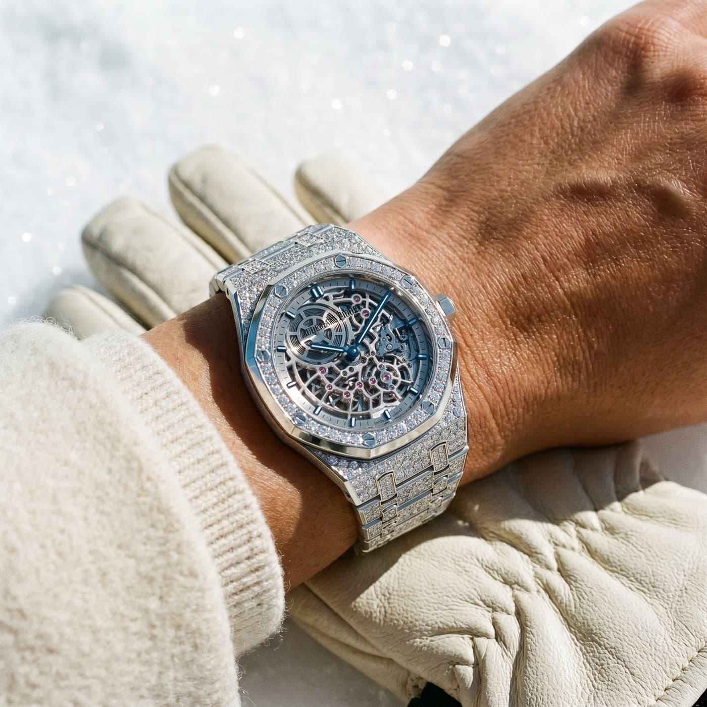 An Audemars Piguet Royal Oak over a ski glove