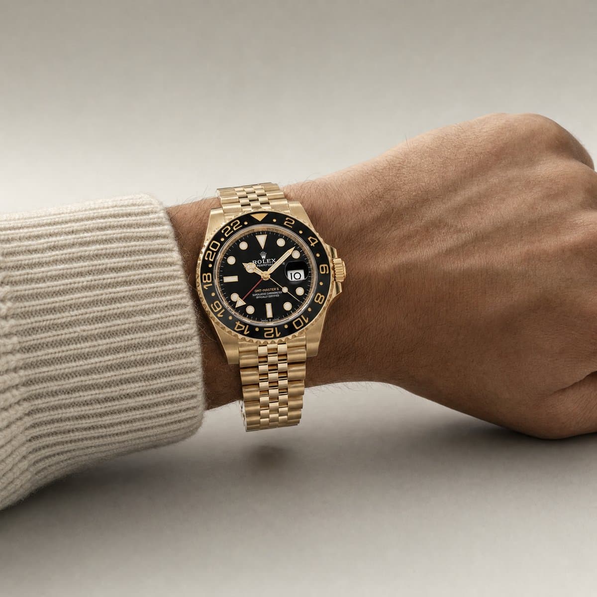 Rolex GMT-Master II 126718GRNR Yellow Gold Black Dial Jubilee (2026) — worn